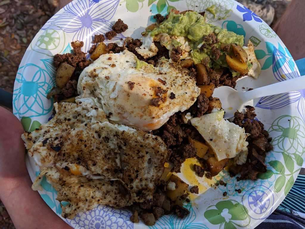 Breakfast hash krause springs camping with venison, potatoes, eggs, onion, and avocado